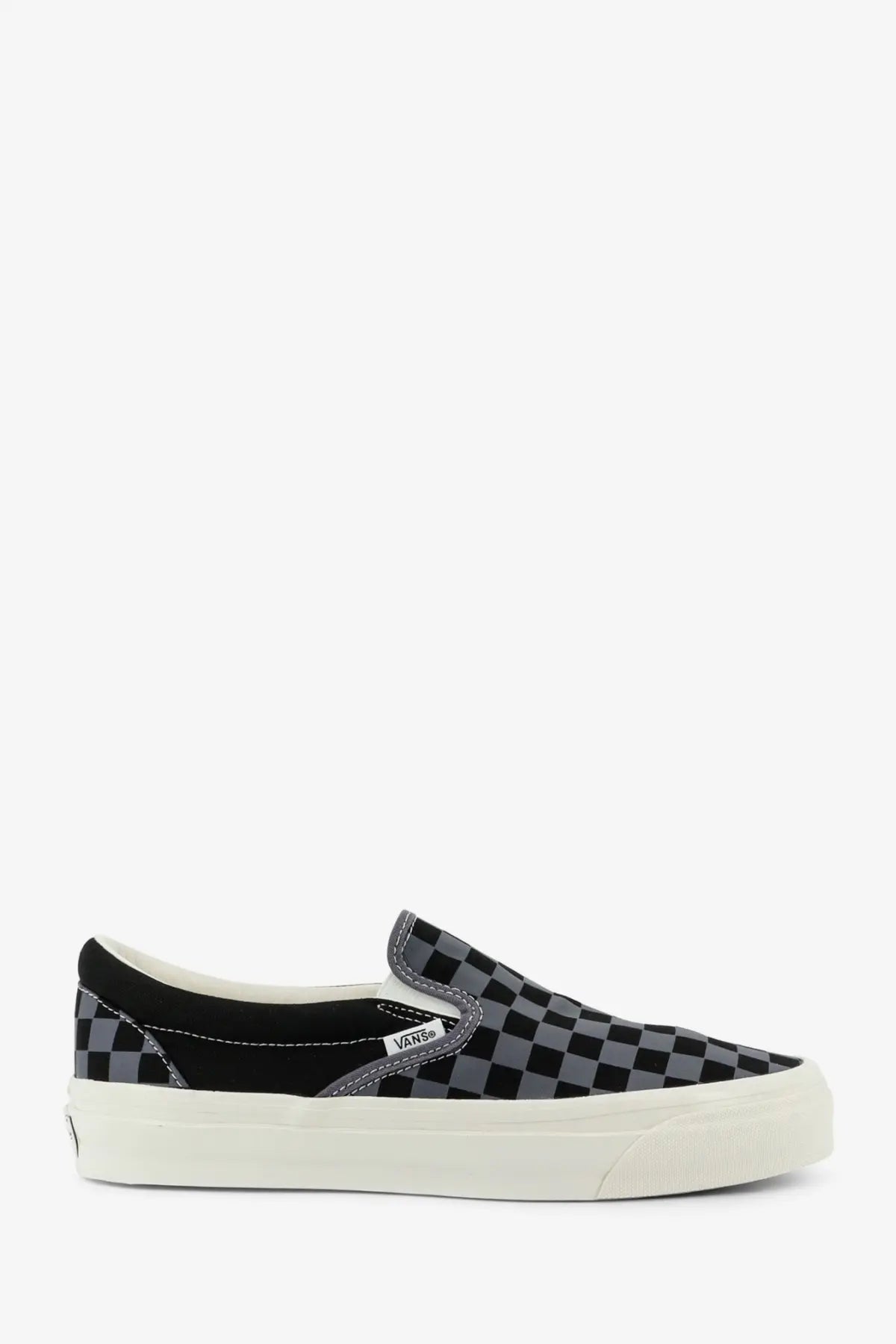 Vans men’s lx classic slip on canvas sneakers in black and gray checkerboard with white rubber sole