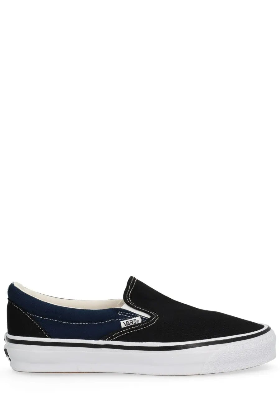 Vans men’s sneaker black canvas slip-on with navy blue suede panel white rubber sole classic Vans logo on side