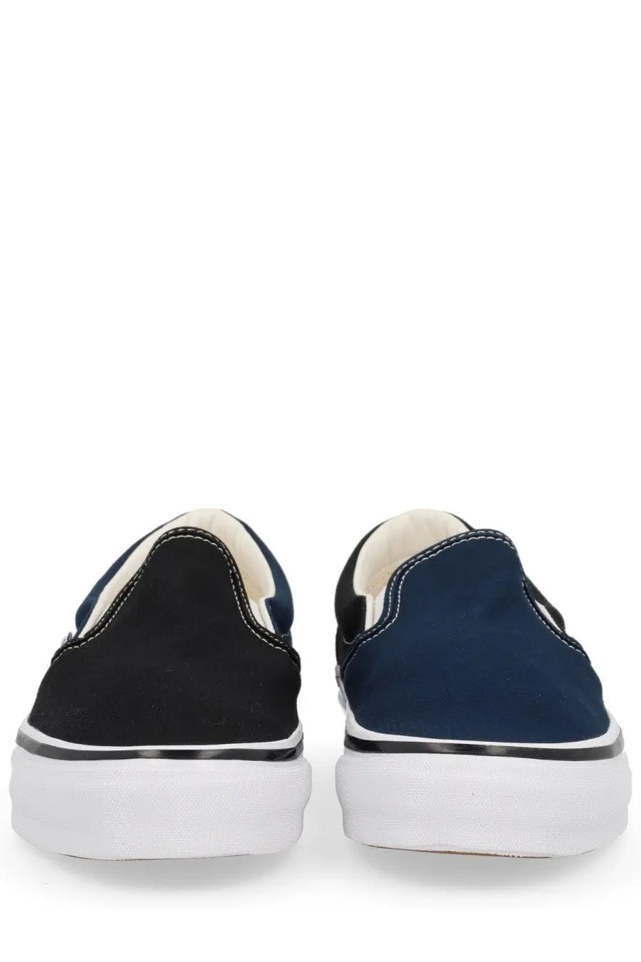 Vans men’s slip-on sneakers in black and navy blue with white rubber soles and contrasting stitching from engineered garments multicolor collection