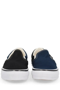 Vans men’s slip-on sneakers in black and navy blue with white rubber soles and contrasting stitching from engineered garments multicolor collection