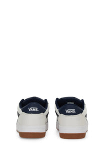 Vans men’s sneaker Hylane in white and navy blue with gum rubber sole skate shoes shown from the back side