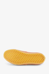 Orange rubber sole with distinctive diamond-patterned tread on vans unisex lx authentic canvas red sneakers