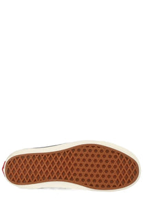 Brown rubber sole with diamond-patterned tread and white sidewall on vans unisex sneaker authentic pattern