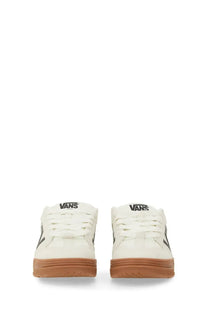 Vans unisex Upland sneaker white with black side stripes and gum-colored rubber soles in classic canvas design