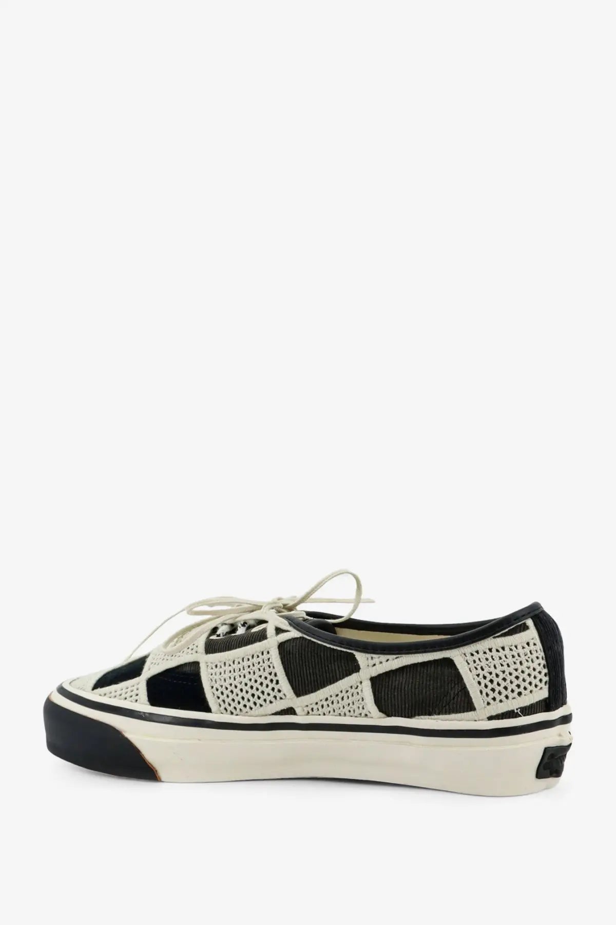 Vans womens lx authentic sneakers black with black and white mesh patterned slip-on design and classic rubber sole
