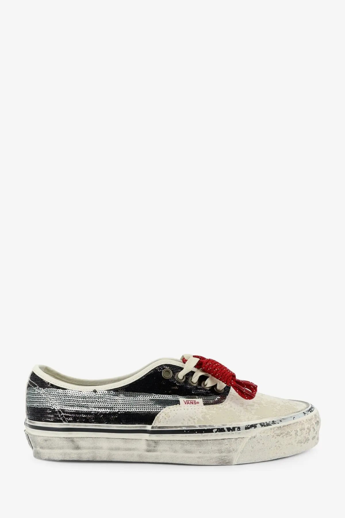 Vans women’s LX Authentic suede sneakers black with washed-out white and black design, glittery silver stripe, red laces, and distressed sole