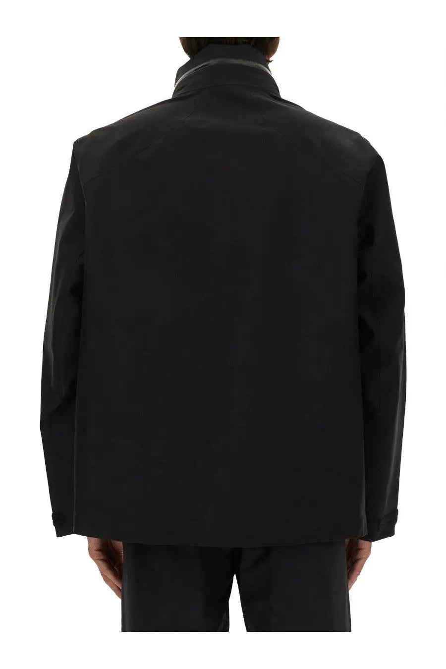 Veilance men’s black utility jacket with sleek minimalist design and subtle tonal contrast along collar