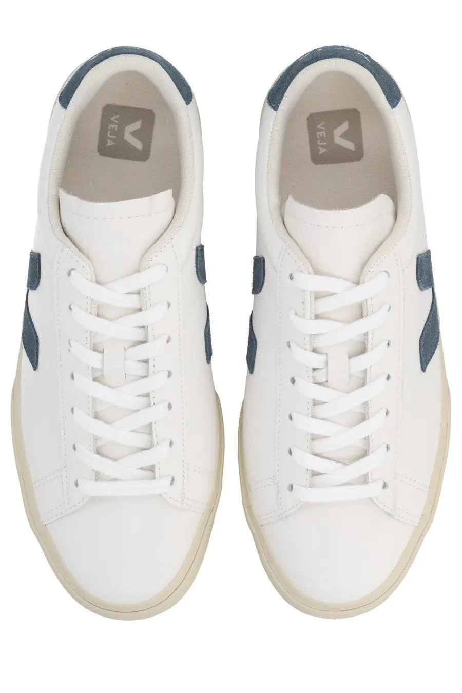 Veja unisex sneaker campo white is a white leather sneaker with navy blue accents and beige rubber sole