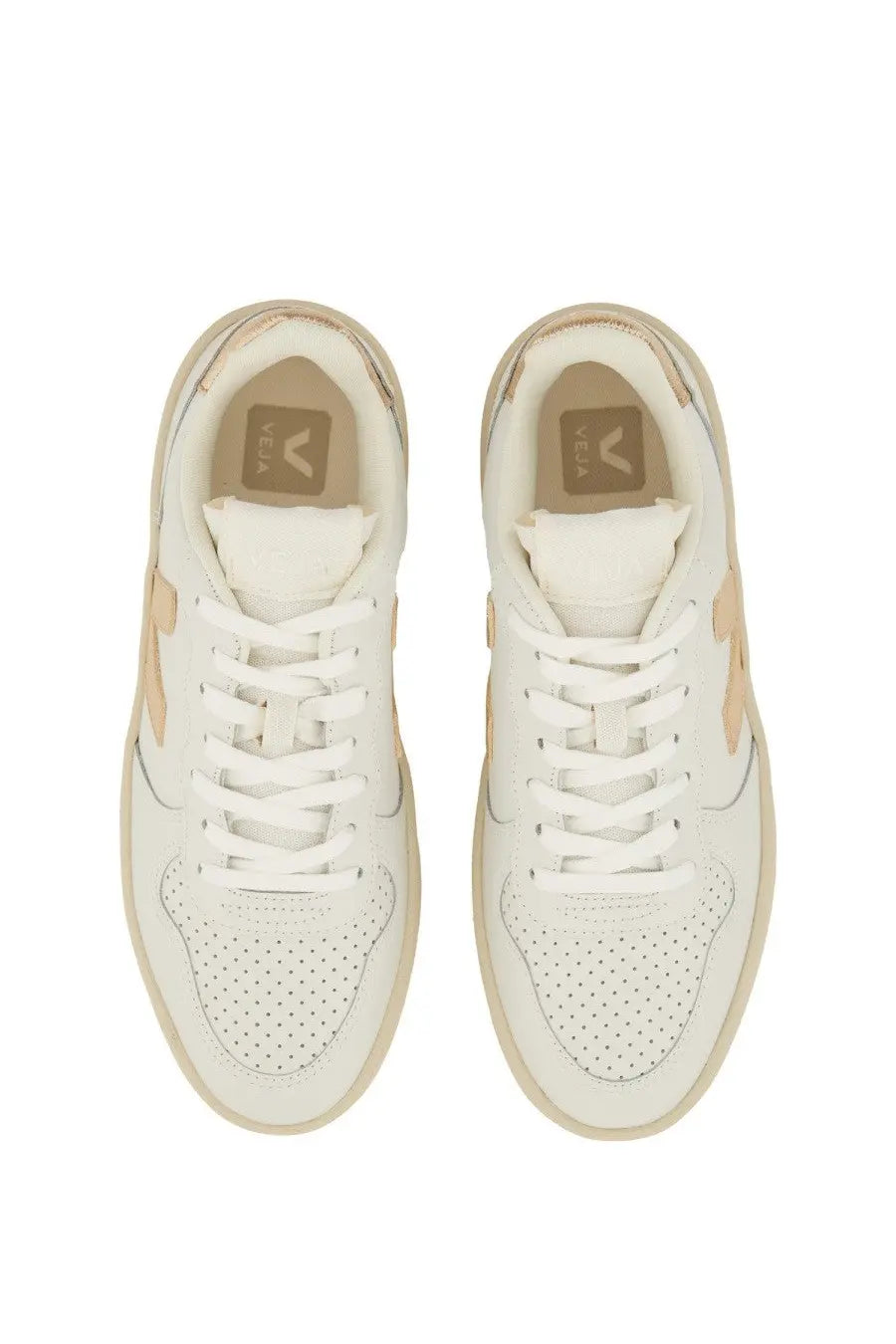 Veja women’s white leather vela sneakers with beige accents and perforated toe boxes for casual wear