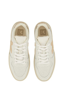 Veja women’s white leather vela sneakers with beige accents and perforated toe boxes for casual wear