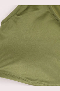 Venuja women’s nylon bikini in olive green satin with fine even stitching along the edges
