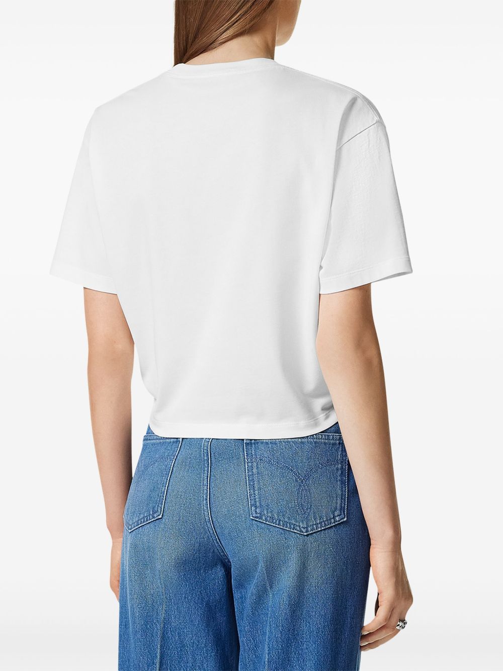 Versace - Versace logo-embroidered T-shirt in white - Topwear