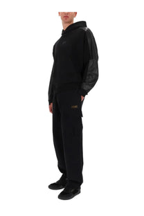 Versace jeans couture black men’s hoodie with glossy leather sleeves and small embroidered logo on chest