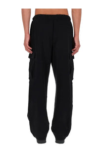 Versace jeans couture men’s black cargo jogger pants featuring wide legs and large side pockets in cotton blend