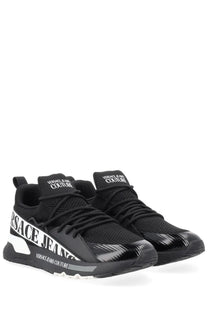 Versace jeans couture men’s sneaker con black with bold white branding and glossy toe cap finish
