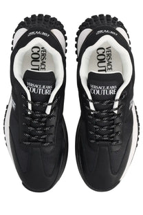 Versace Jeans Couture men’s sneaker con black with black and white mesh upper, chunky rubber sole, and bold tongue branding