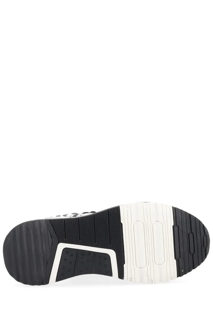 Black and white rubber sole with textured tread pattern on versace jeans couture men’s con black sneaker