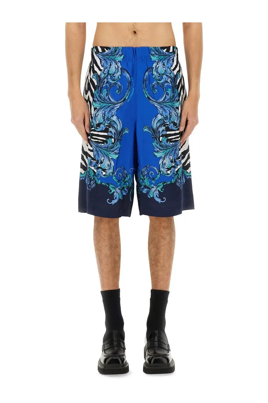 Versace jeans couture men’s viscose shorts in vibrant blue with ornate swirling pattern and black and white zebra stripes