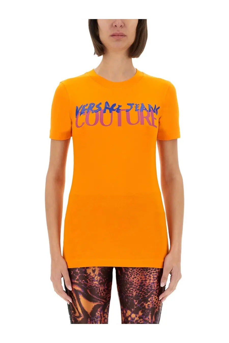 Bright orange versace jeans couture women’s institutional short-sleeved shirt with bold blue and pink logo lettering