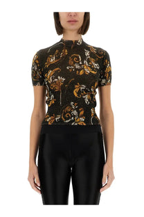 Versace Jeans Couture women’s black knitted short-sleeved shirt with gold and white ornate baroque pattern