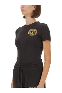 Versace Jeans Couture women’s black short-sleeved t-shirt with gold circular logo on the chest