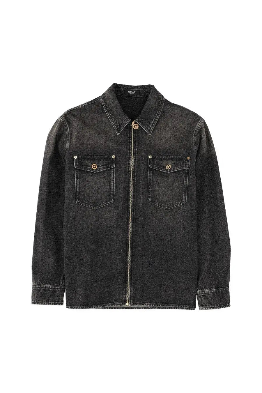 Versace men’s black denim jacket with zipper front, two brass button chest pockets, and rolled cuffs