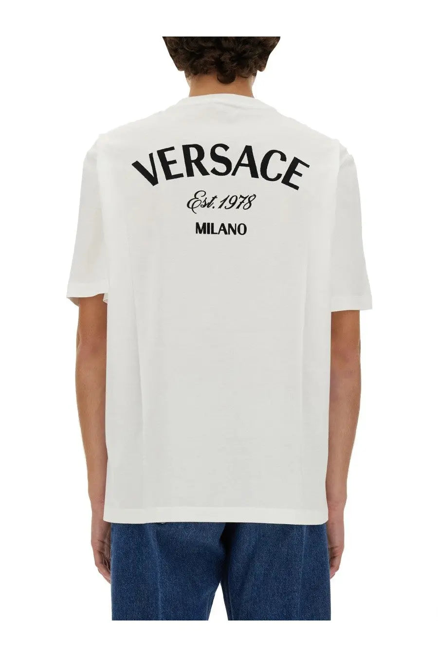 White Versace men’s t-shirt featuring black Versace est logo on front in soft cotton material