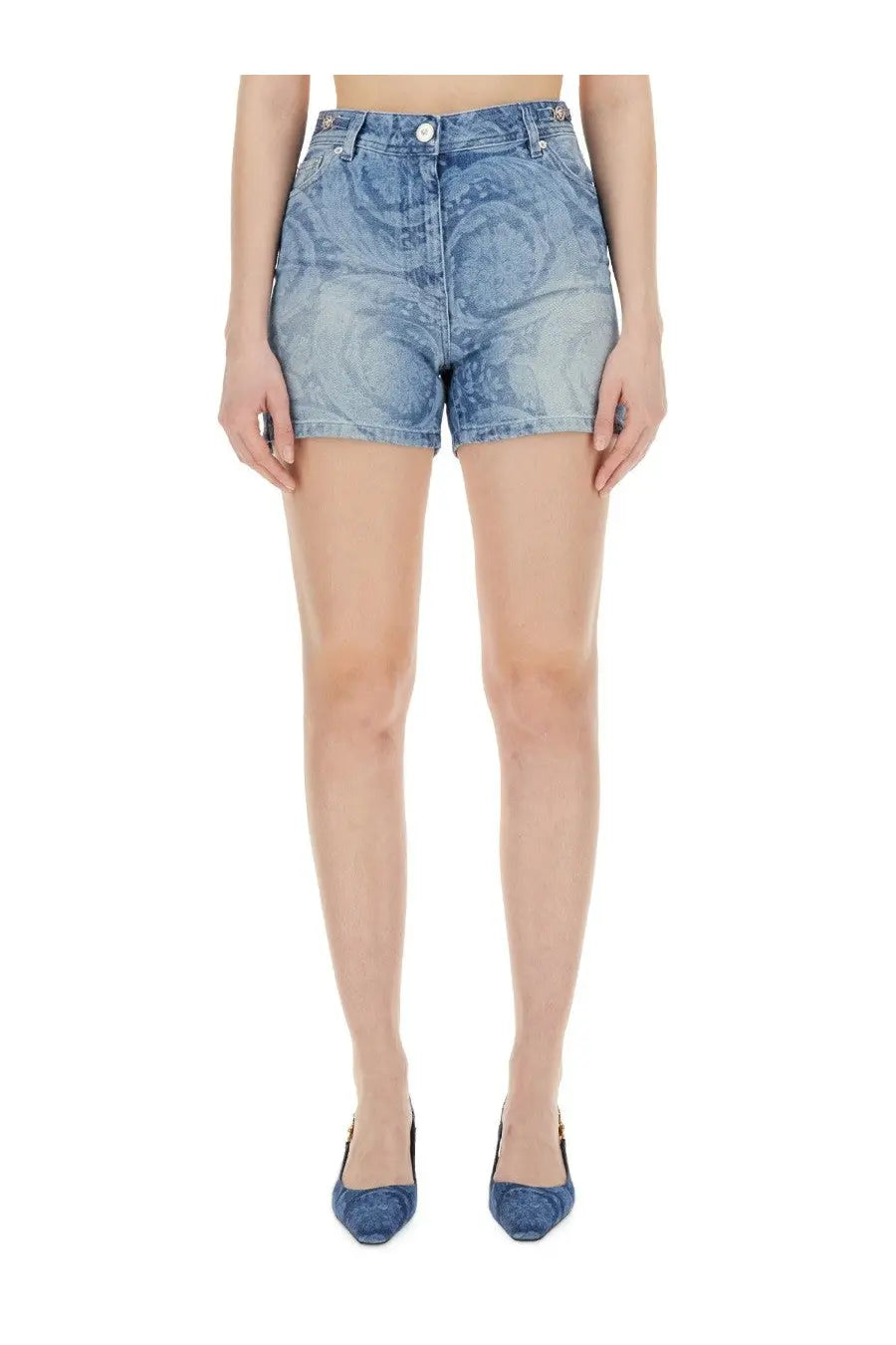 Versace women’s blue denim shorts with a subtle swirling pattern on the fabric