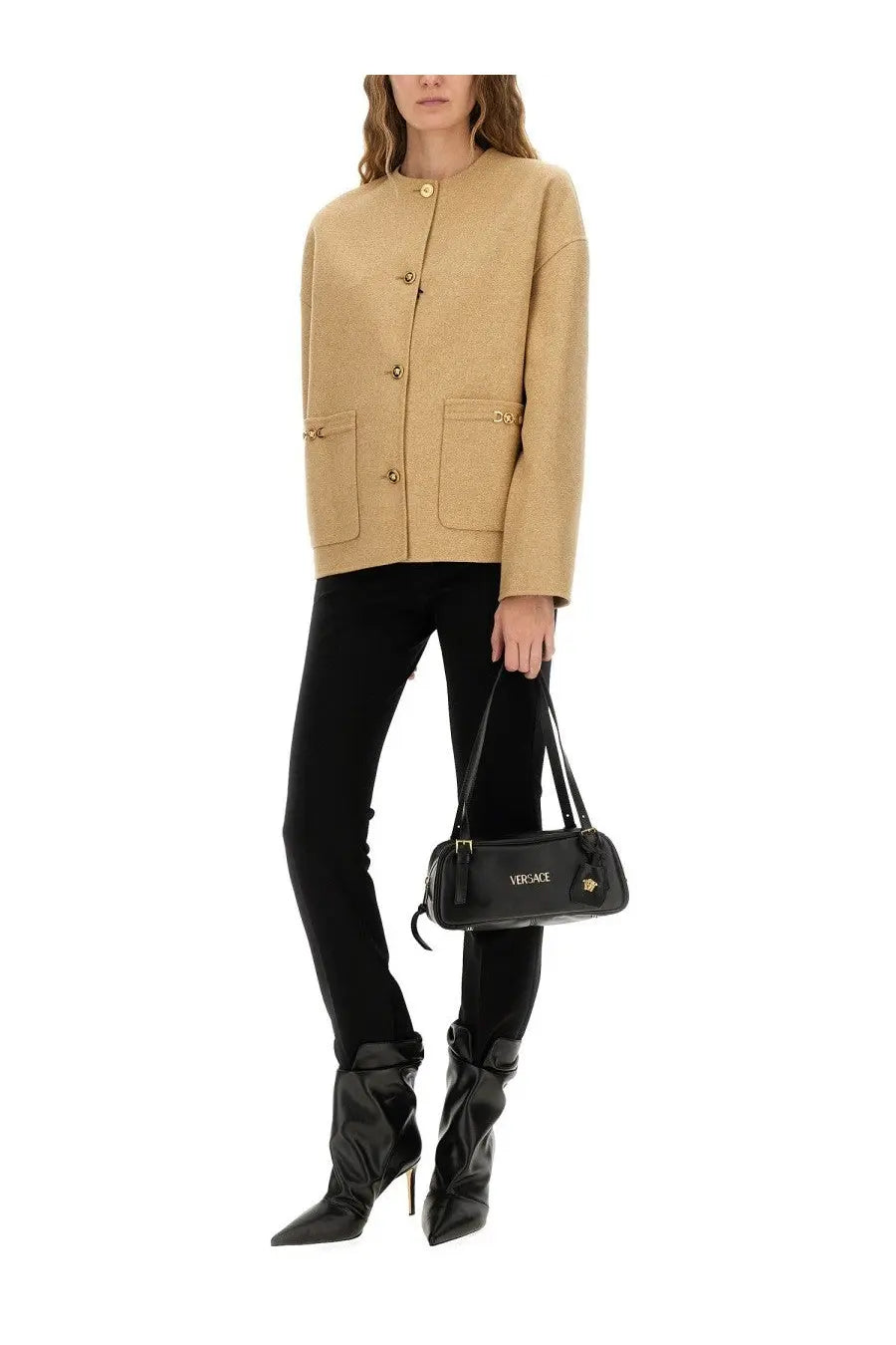 Black leather versace handbag with gold-tone hardware and logo detailing paired with versace women’s medusa buttoned beige jacket