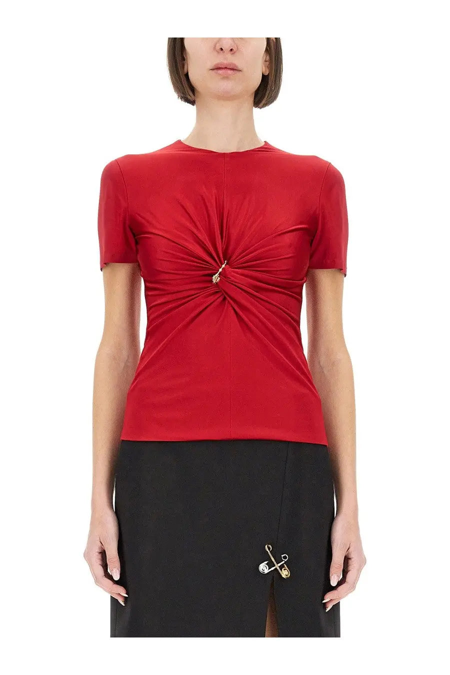 Versace women’s vibrant red short-sleeved top with central twisted knot and gold-tone safety pin detail