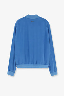 Versace women’s solid blue bomber jacket with smooth lightweight silk fabric and subtle seam detailing
