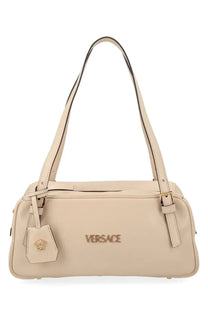 Beige leather versace women’s tag bag with gold-tone logo and medusa head charm in white style