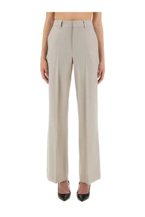Beige high-waisted straight-leg trousers by victoria beckham with a sleek tailored fit perfect for work or casual wear