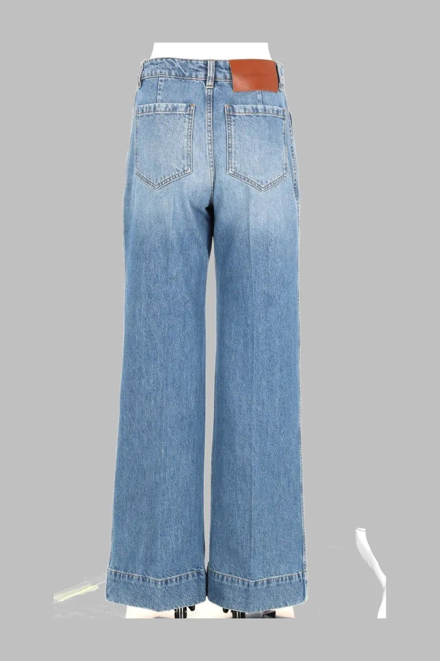 Victoria Beckham women’s jeans Alina blue light-wash denim wide-leg pants with brown leather patch at waistband back view