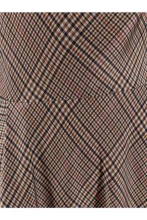 A close-up of Vince women’s tartan long dress in brown tweed fabric with classic houndstooth pattern
