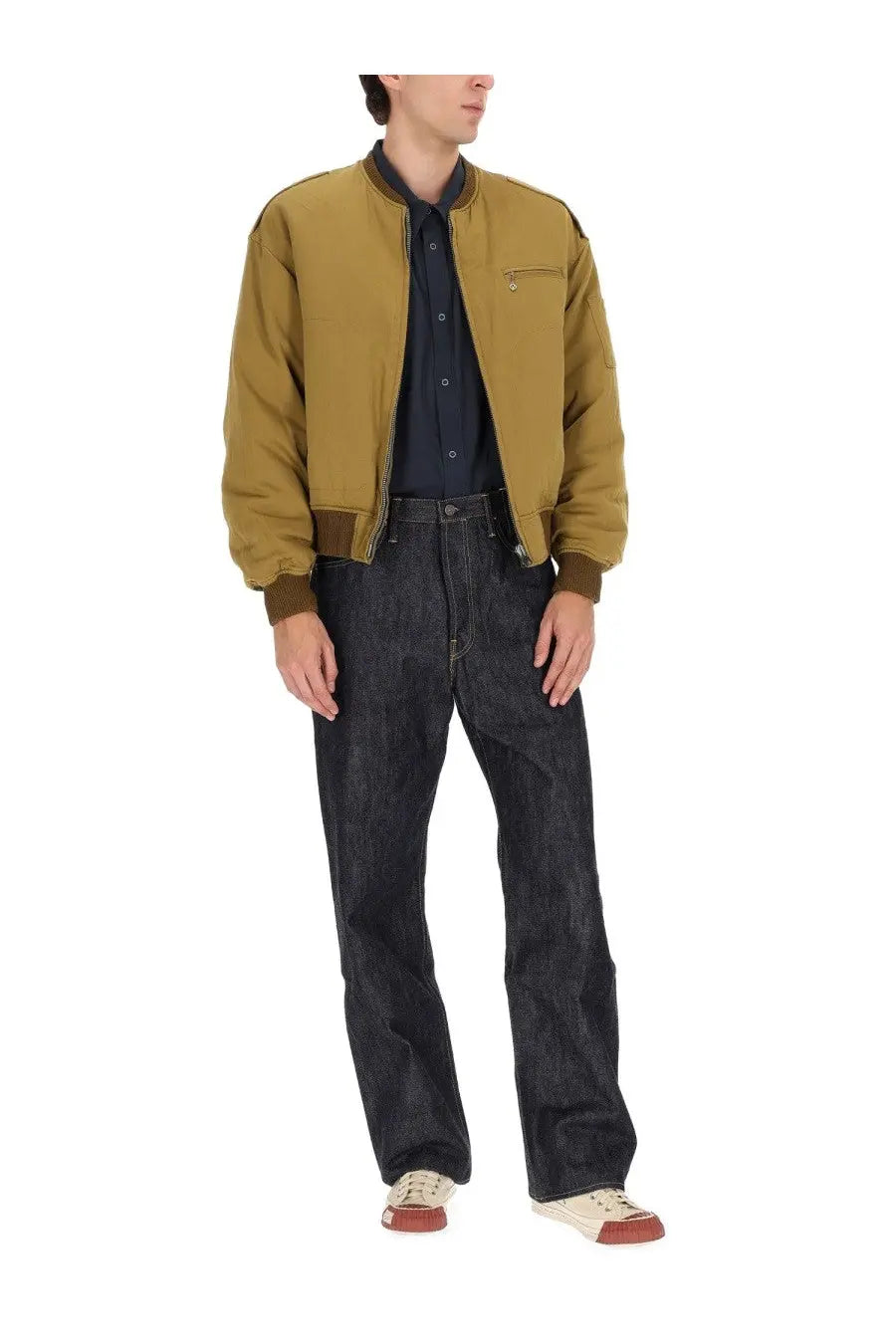 Visvim men’s gunner down jacket in olive green with dark brown ribbed cuffs and collar for cold weather wear