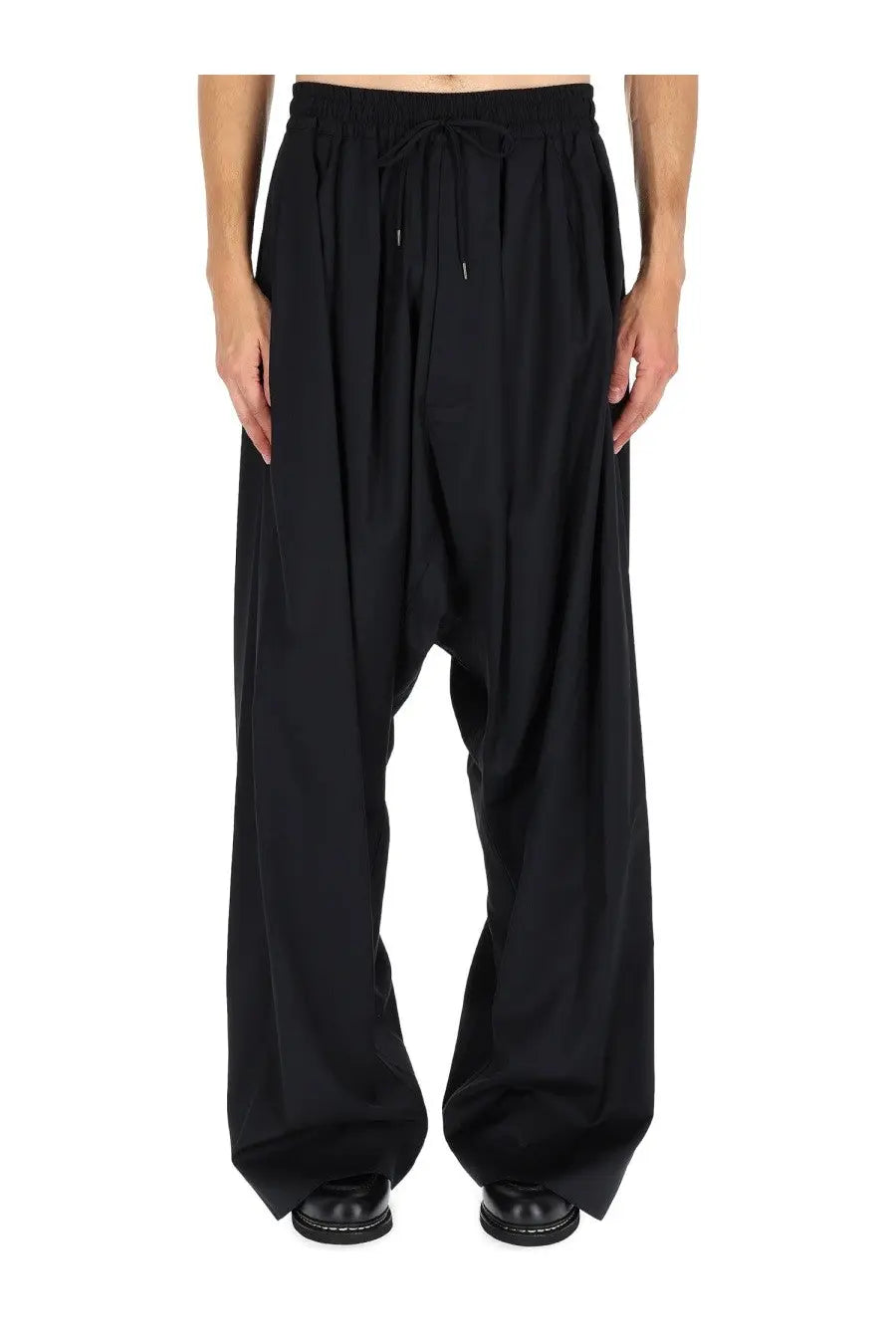 Vivienne Westwood men’s black drawstring harem pants with loose flowing silhouette and tapered legs