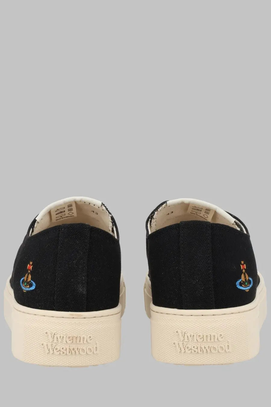 Back view of vivienne westwood black canvas men’s slip-on sneakers with cream rubber sole and embroidered logo heel