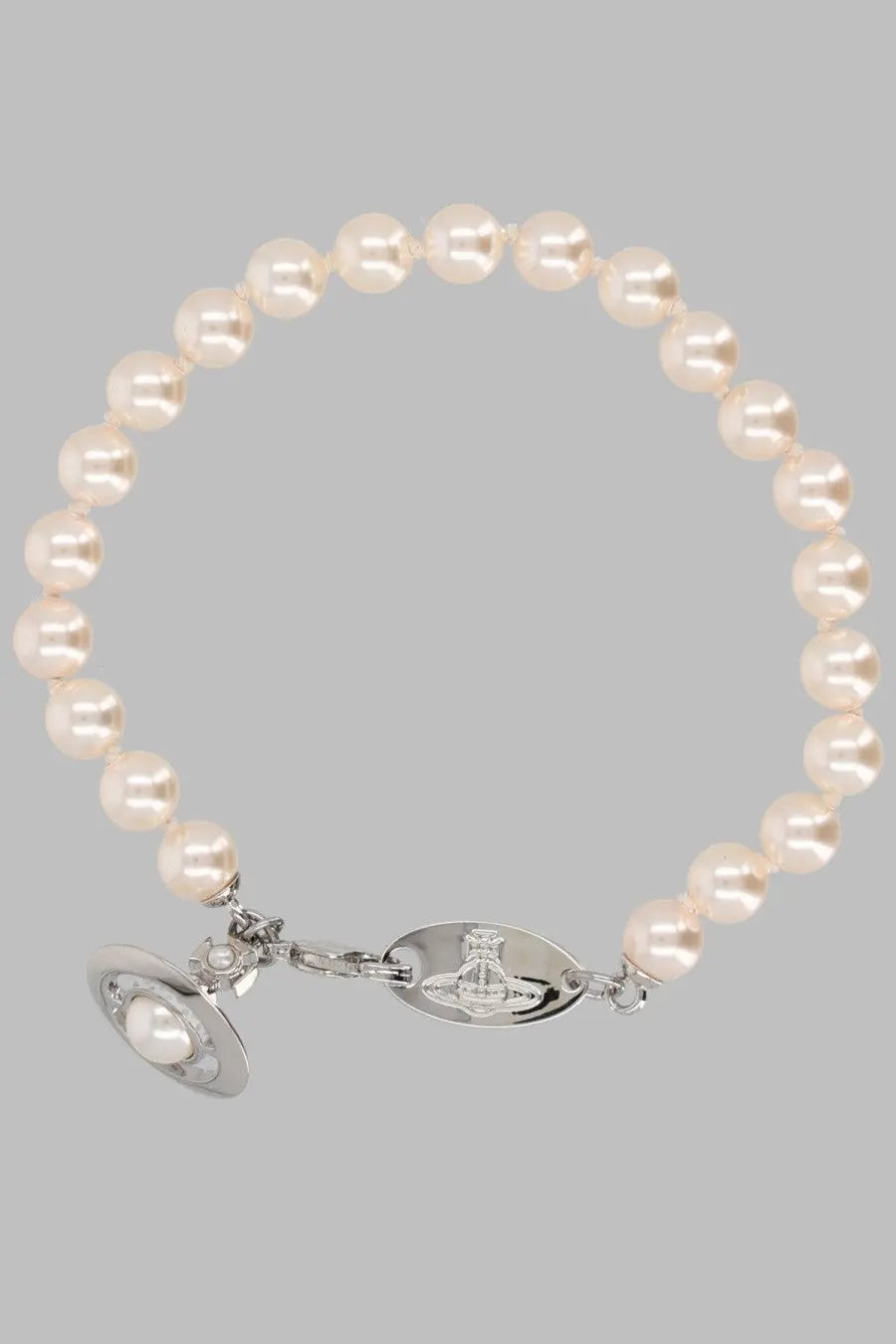 Vivienne Westwood women’s gold pearl bracelet with silver clasp featuring the iconic orb logo and matching charm