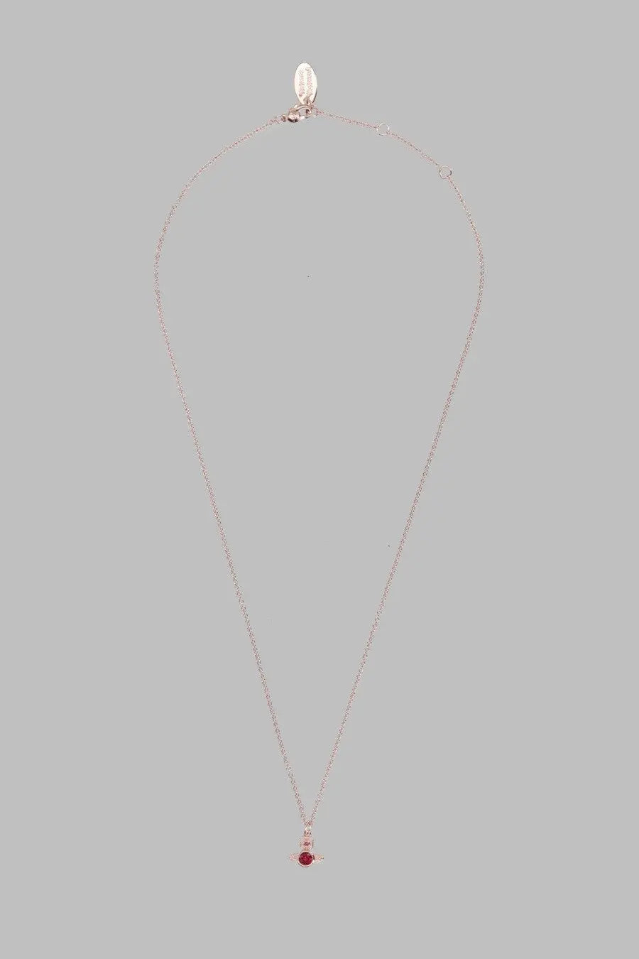 Vivienne Westwood women’s silver chain necklace with a small pendant featuring a red gemstone and pink accents