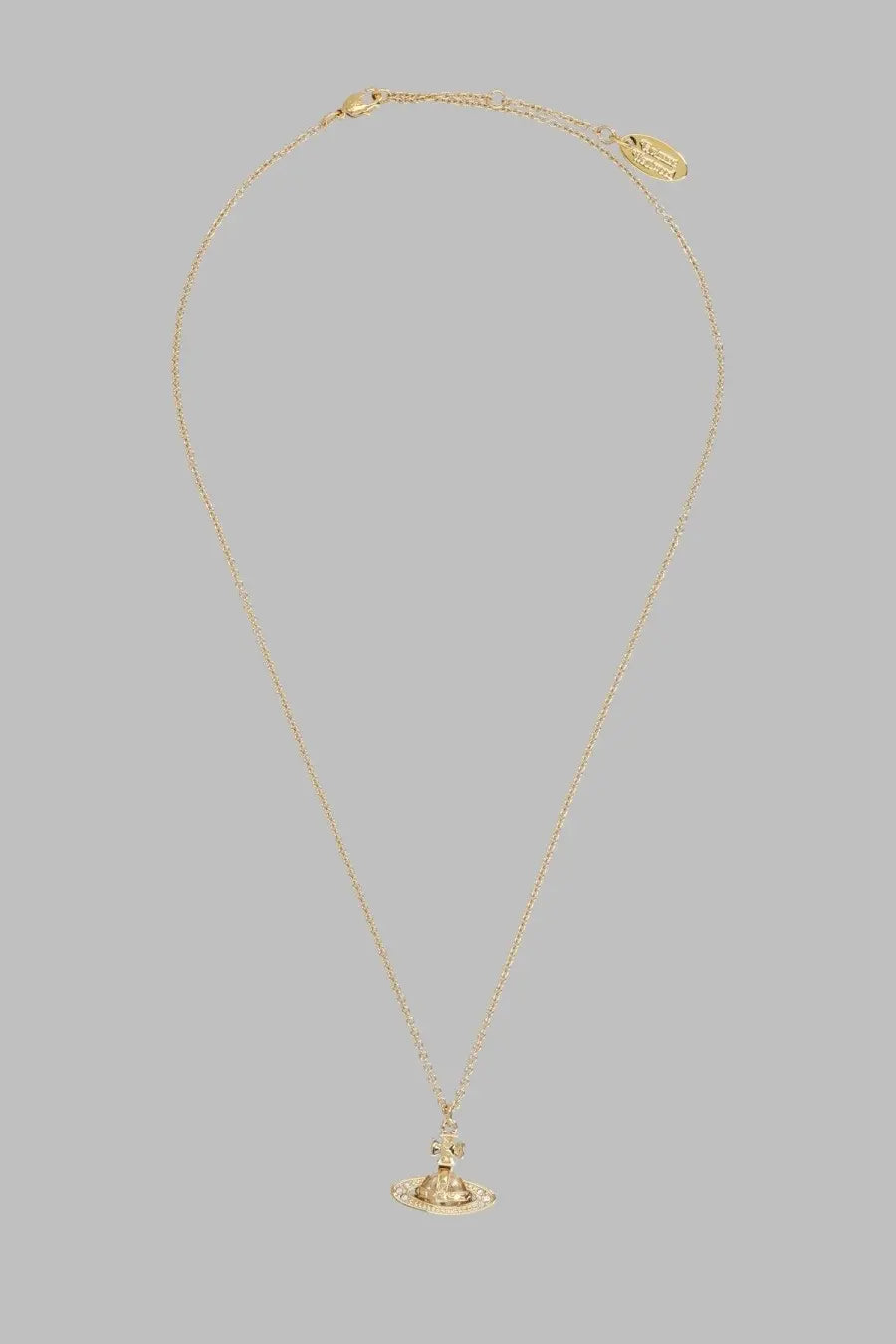 Vivienne Westwood women’s gold necklace with delicate chain and small orb pendant embedded with crystals