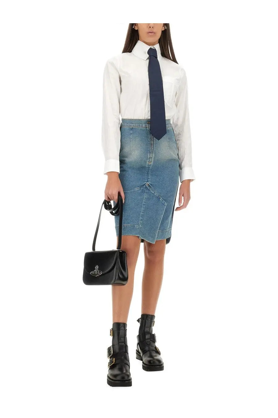 Black leather crossbody bag with silver vivienne westwood logo emblem paired with blue denim midi skirt