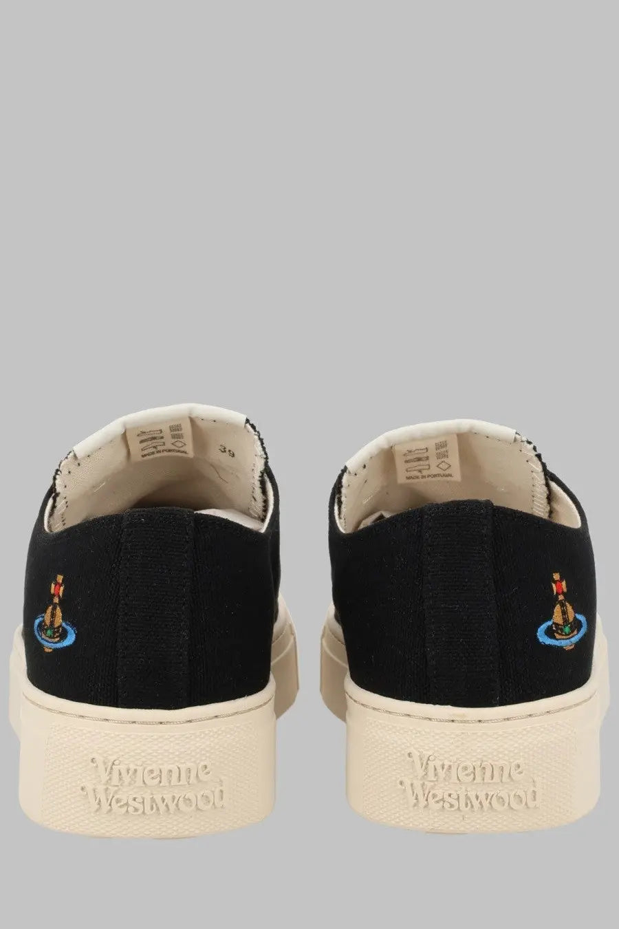 Back view of vivienne westwood women’s low top plimsoll sneaker in black canvas with cream rubber sole and embroidered logo