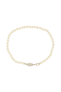 A delicate ivory pearl bracelet with a sleek silver clasp and oval tag from vivienne westwood womens stuart necklace silver collection