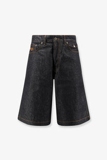 Walk in paris men’s baggy raw denim shorts in dark-wash cotton with relaxed wide-leg cut and subtle orange stitching