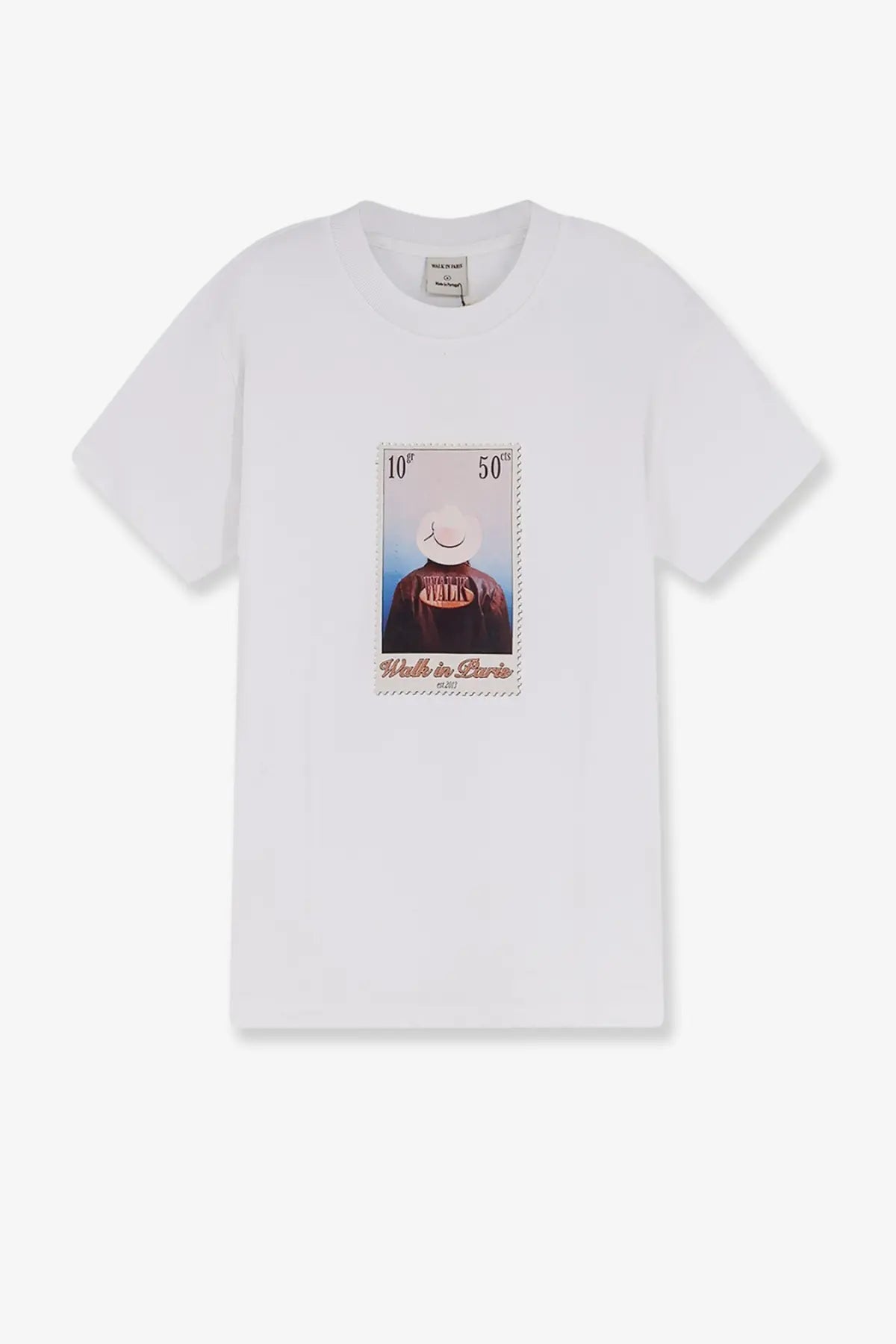 White cotton walk in paris men’s t-shirt with vintage postage stamp graphic featuring smiling face made in Paris text