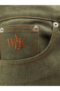Olive green denim jeans pocket with brown embroidered wak logo and silver rivets in walk in paris men’s the gardeners denim trousers