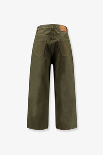 Olive green wide-leg denim trousers with brown leather patch at waistband from Walk In Paris men’s The Gardeners Denim Trousers Green