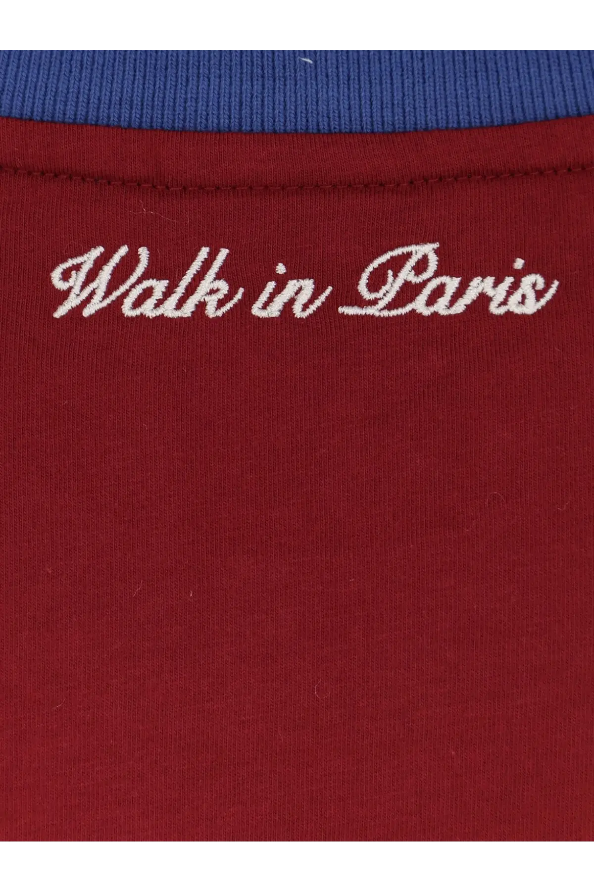 A maroon cotton walk in paris men’s love paris shirt with white embroidered script and blue ribbed collar