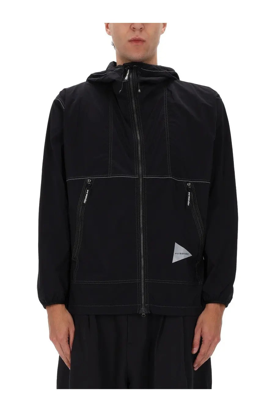 And wander men’s black partex jacket with hood contrasting white stitching and triangular logo patch on lower left side